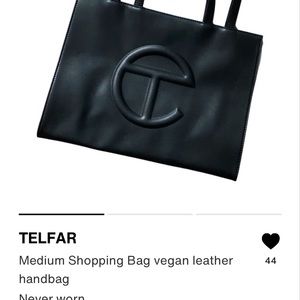 Excellent condition Telfar black bag. Never worn! Medium size!! Includes bag.